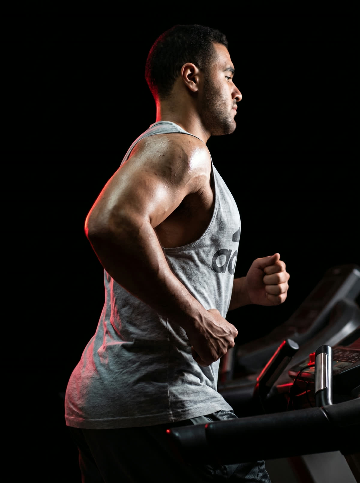 Coach Mohamed running on a treadmill